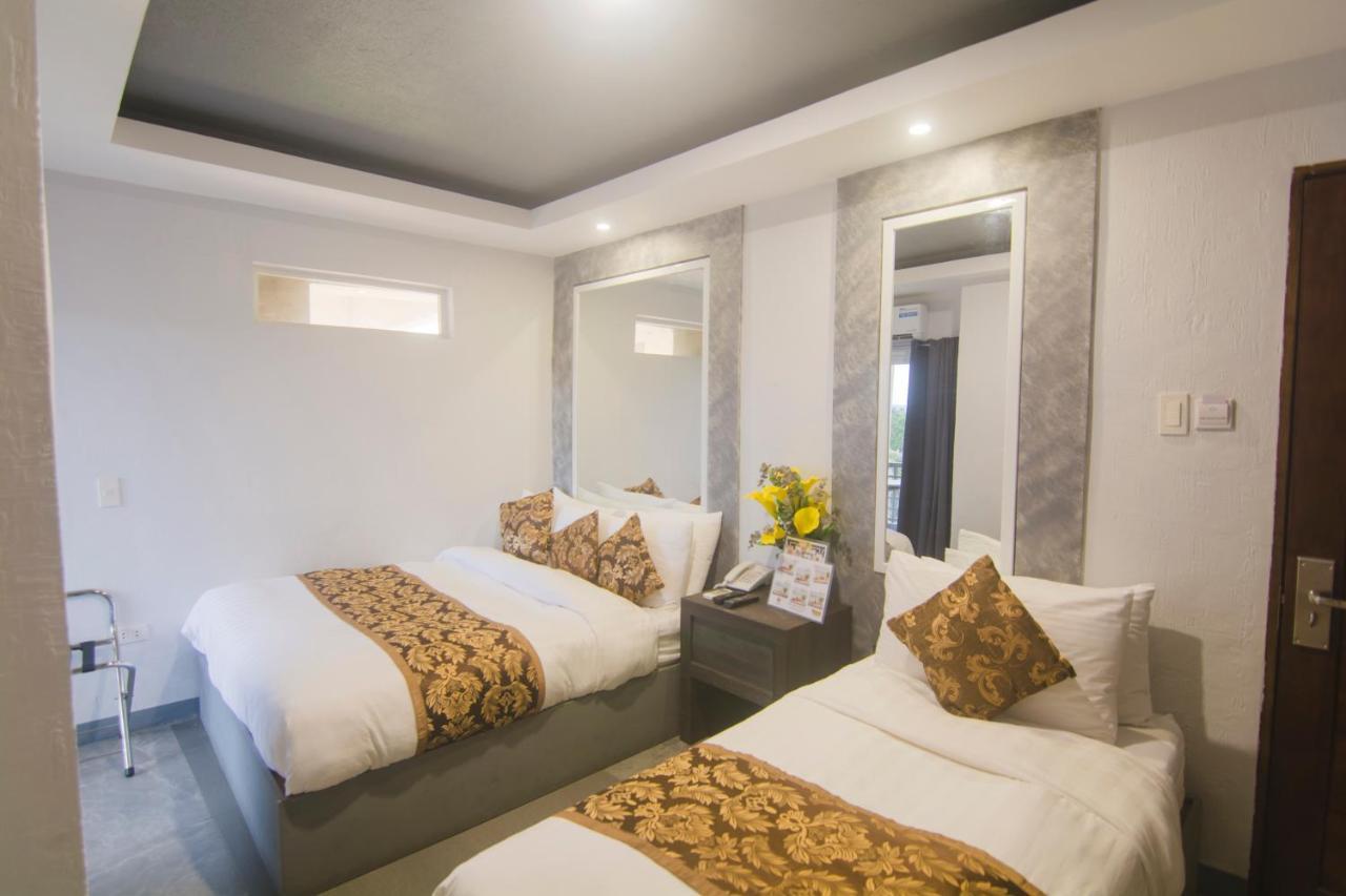 Hotel Carmelita Tuguegarao Extérieur photo